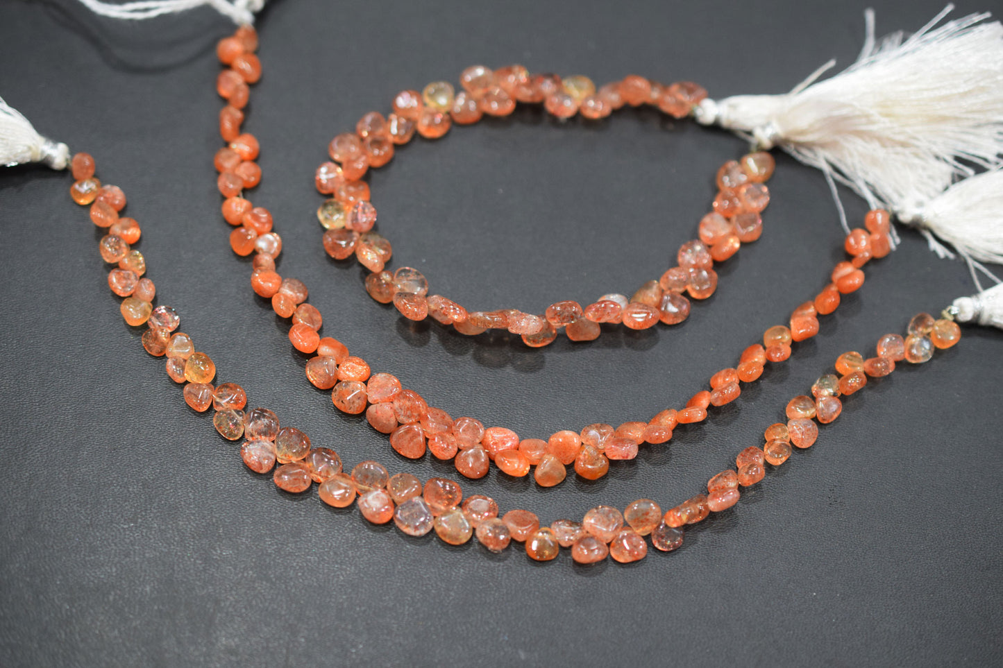 Sunstone Smooth Heart Shape Smooth Briolettes , Sold By Strand , 5x5 - 7x7 mm , 8" , 17561
