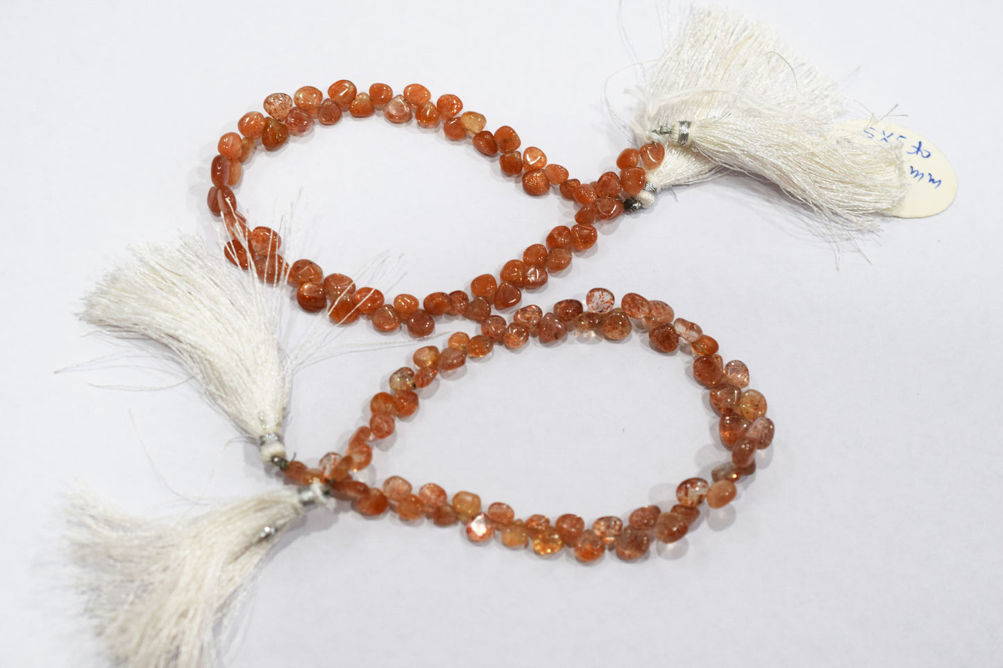 Sunstone Smooth Heart Shape Smooth Briolettes , Sold By Strand , 5x5 - 7x7 mm , 8" , 17561