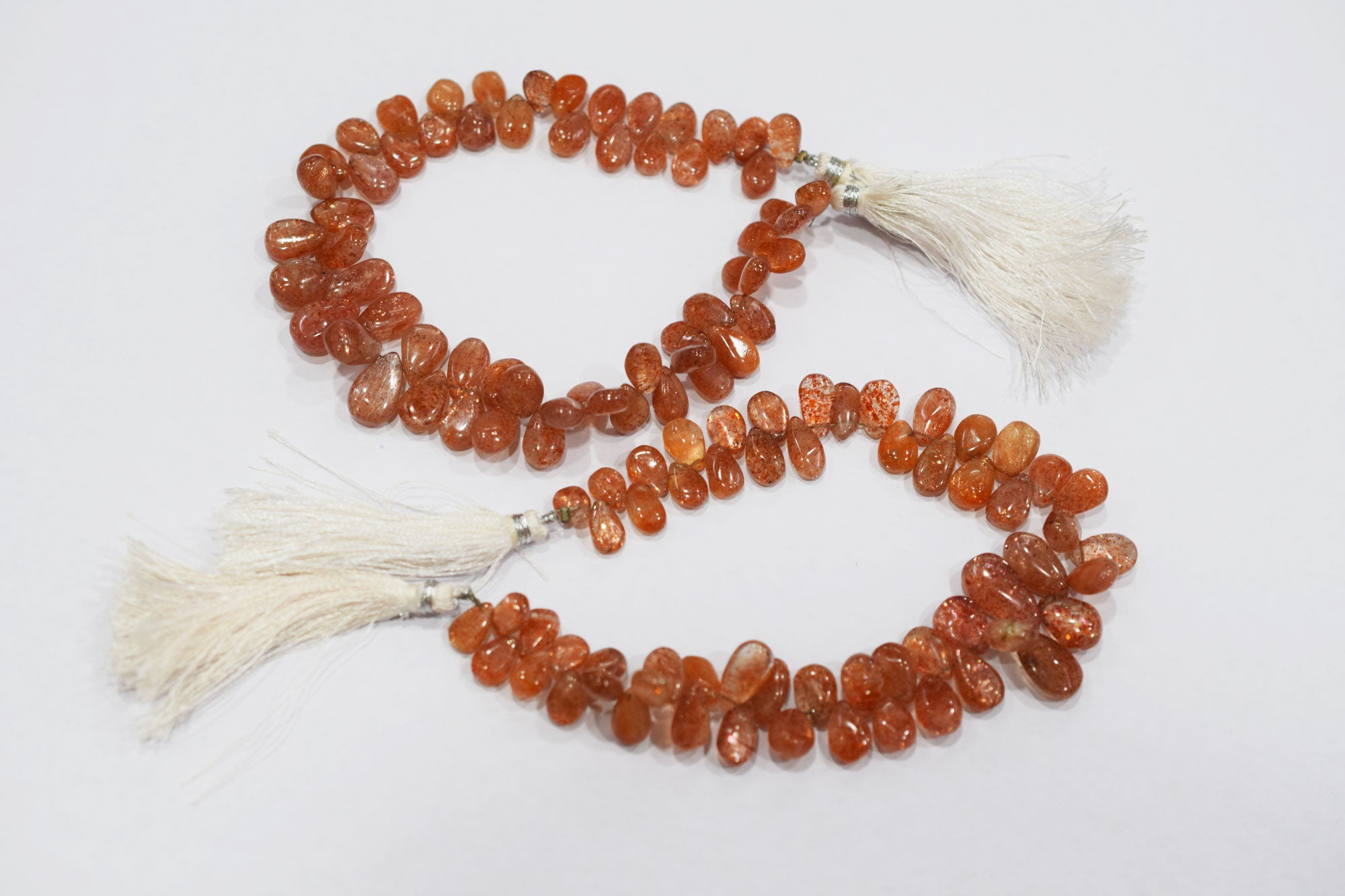 Sunstone Smooth Pear Shape Smooth Briolettes , Sold By Strand , 5x7 - 8x12 mm , 8" ,  17567