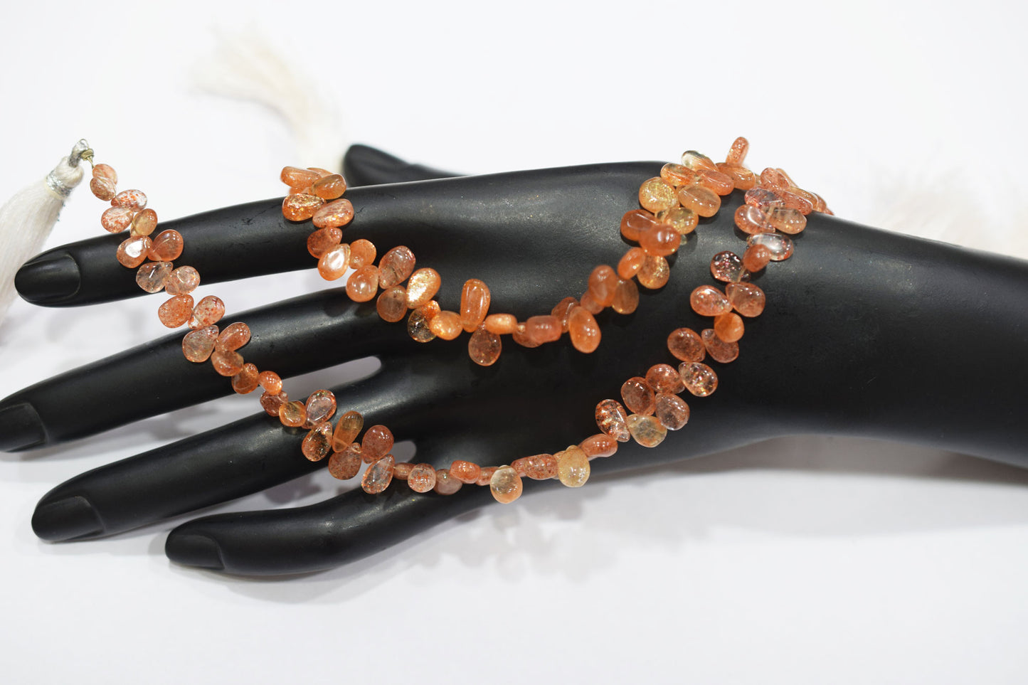 Sunstone Smooth Pear Shape Smooth Briolettes , Sold By Strand , 5x7 - 6x8 mm , 8" , 17568
