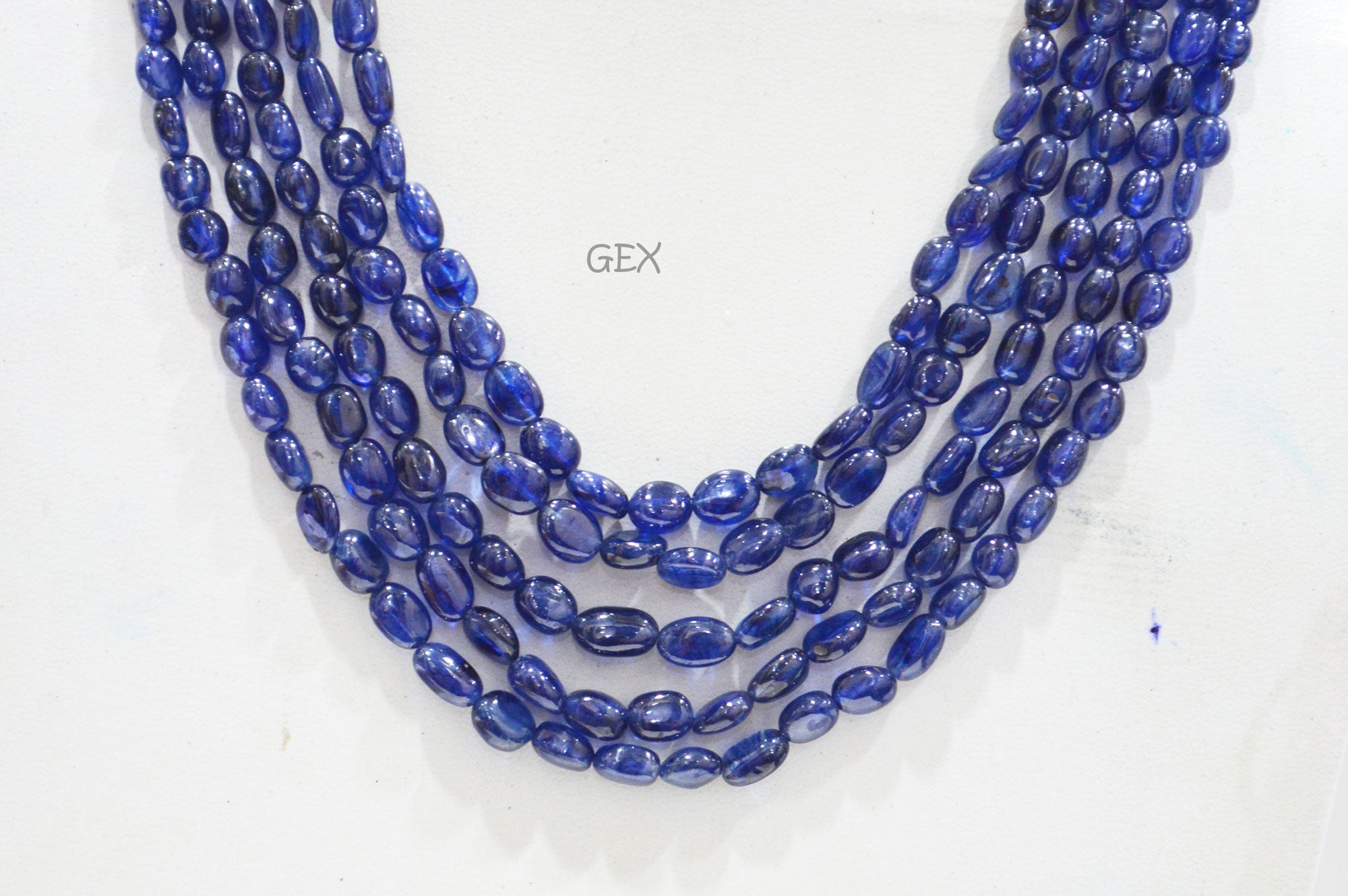 Sapphire Glass Filled Smooth Oval Nuggets Shape Necklace , Sapphire Glass Filled 5 Line Necklace 16 - 19 Inches Long With Adjustable Tussle , 6x7 - 6.50x10 mm , 32008