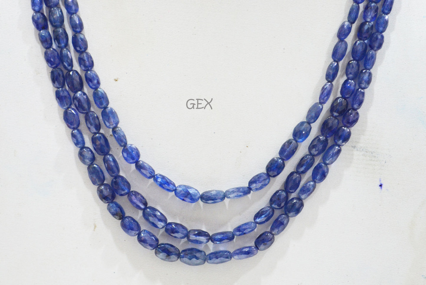 Sapphire Glass Filled Faceted Oval Nuggets Shape Necklace , Sapphire Glass Filled 3 Line Necklace 18 - 20 Inches Long With Adjustable Tussle , 5x7 - 7x10.50 mm , 32025