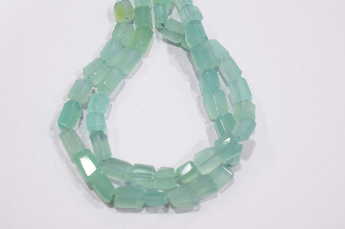 Aqua Chalcedony Laser Cut Beads , Sold By Strand , 7x7 - 7.50x9.50 mm , 16" , 32093