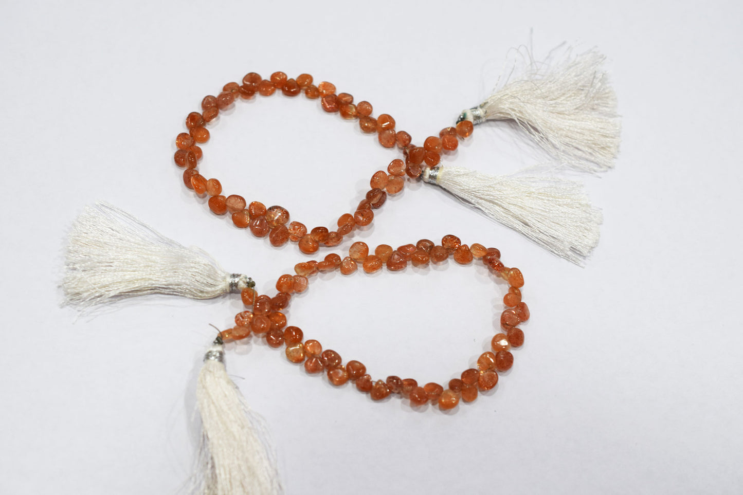Sunstone Smooth Heart Shape Smooth Briolettes , Sold By Strand , 5.50x5.50 - 6x6 mm , 8",  17560