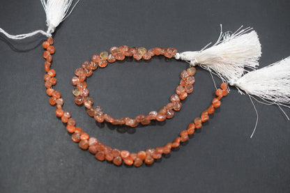Sunstone Smooth Heart Shape Smooth Briolettes , Sold By Strand , 5x5 - 7x7 mm , 8" , 17561