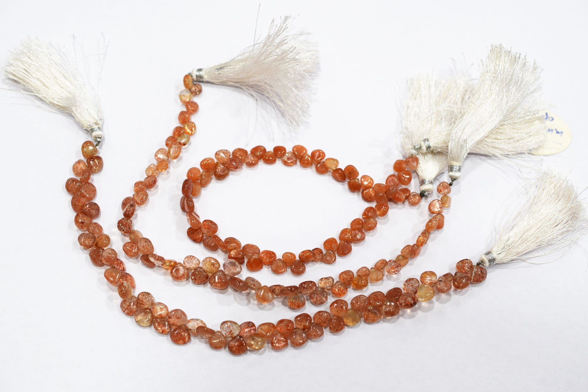 Sunstone Smooth Heart Shape Smooth Briolettes , Sold By Strand , 5x5 - 7x7 mm , 8" , 17561