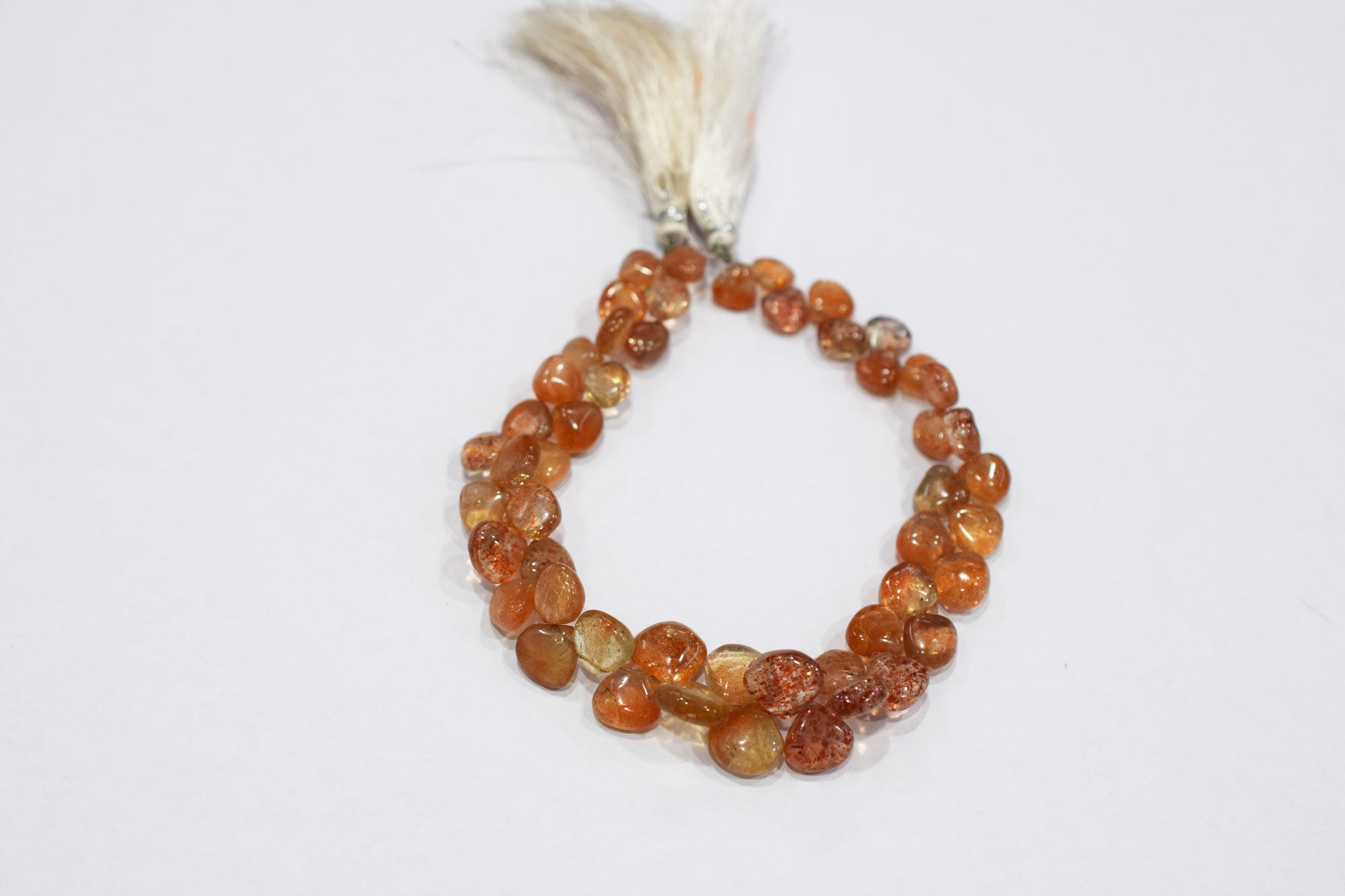 Sunstone Smooth Heart Shape Smooth Briolettes , Sold By Strand , 6x6 - 11x11 mm , 8", 17562