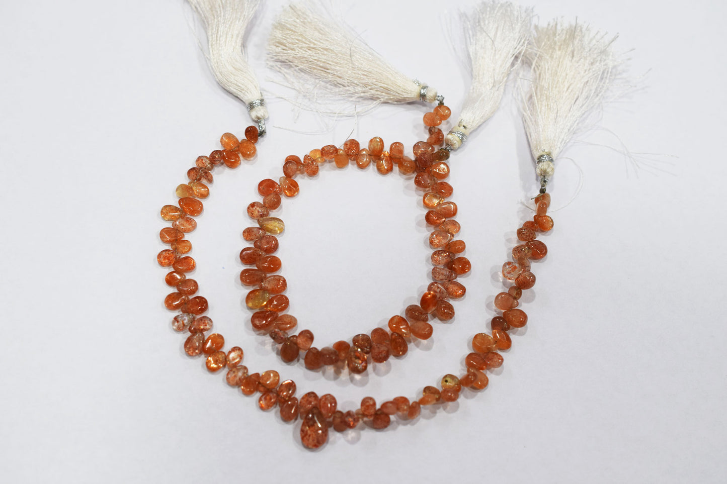 Sunstone Smooth Pear Shape Smooth Briolettes , Sold By Strand , 4x6 - 5x8 mm , 8" ,  17564
