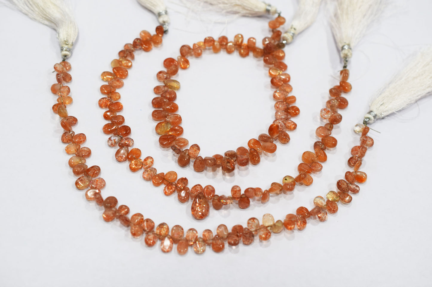 Sunstone Smooth Pear Shape Smooth Briolettes , Sold By Strand , 4x6 - 5x8 mm , 8" ,  17564