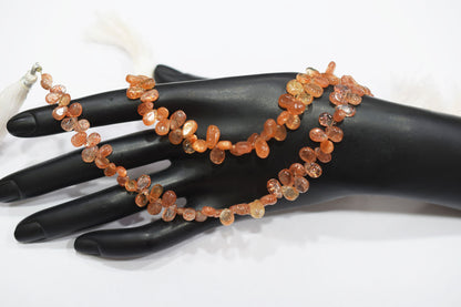 Sunstone Smooth Pear Shape Smooth Briolettes , Sold By Strand , 5x7 - 6x8 mm , 8" , 17568